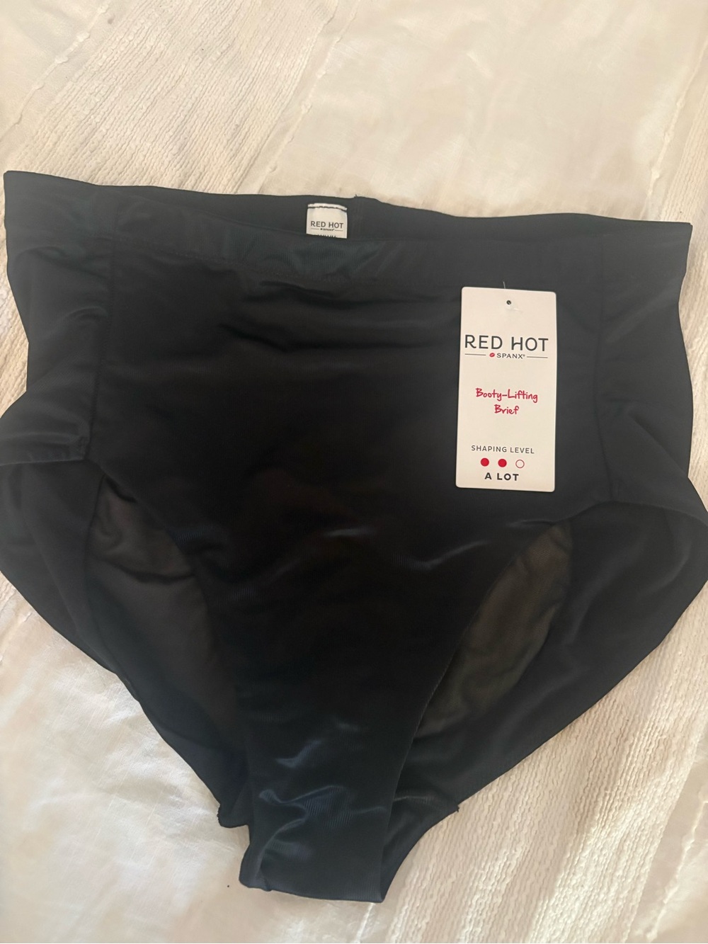 SPANX RED HOT Booty-Lifting Brief in Black